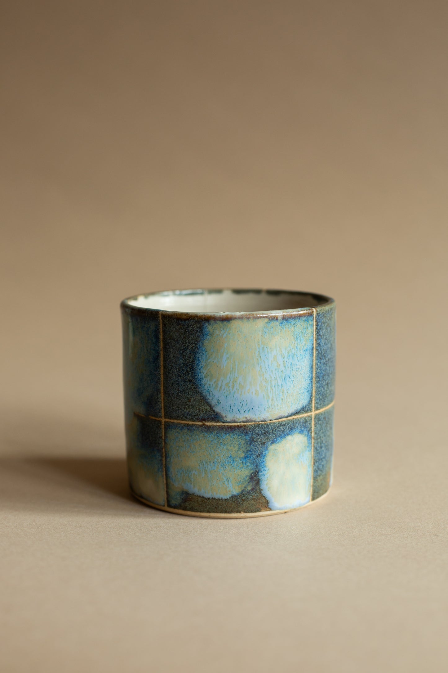 Blue-green checkered-ish melty vessel