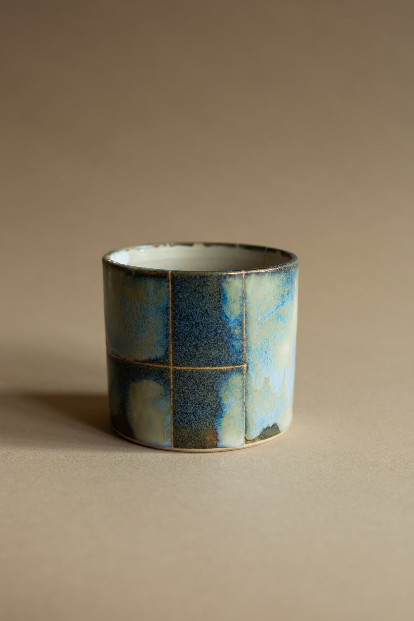 Blue-green checkered-ish melty vessel