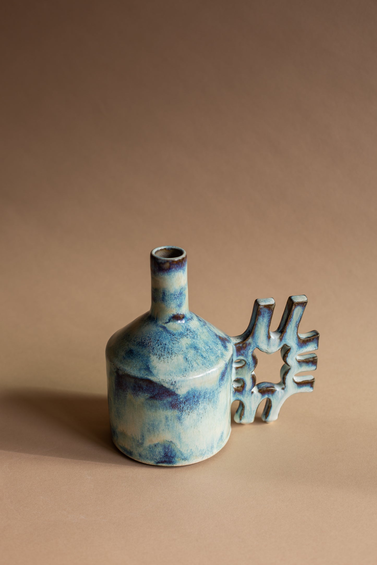 Oil-jug in drippy glaze
