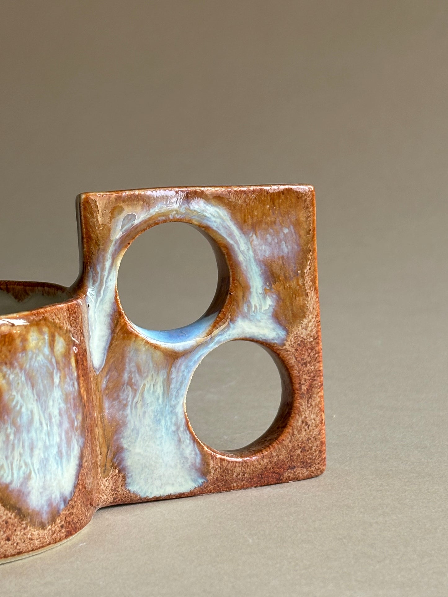 fiery mug with a funky double handle